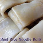 close up view of beef rice noodle rolls
