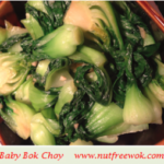 sauteed baby bok choy in a brown plate