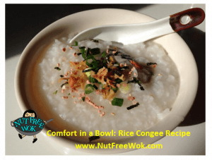 bowl of congee with toppings in a cream colored bowl, with a chinese soup spoon on the side