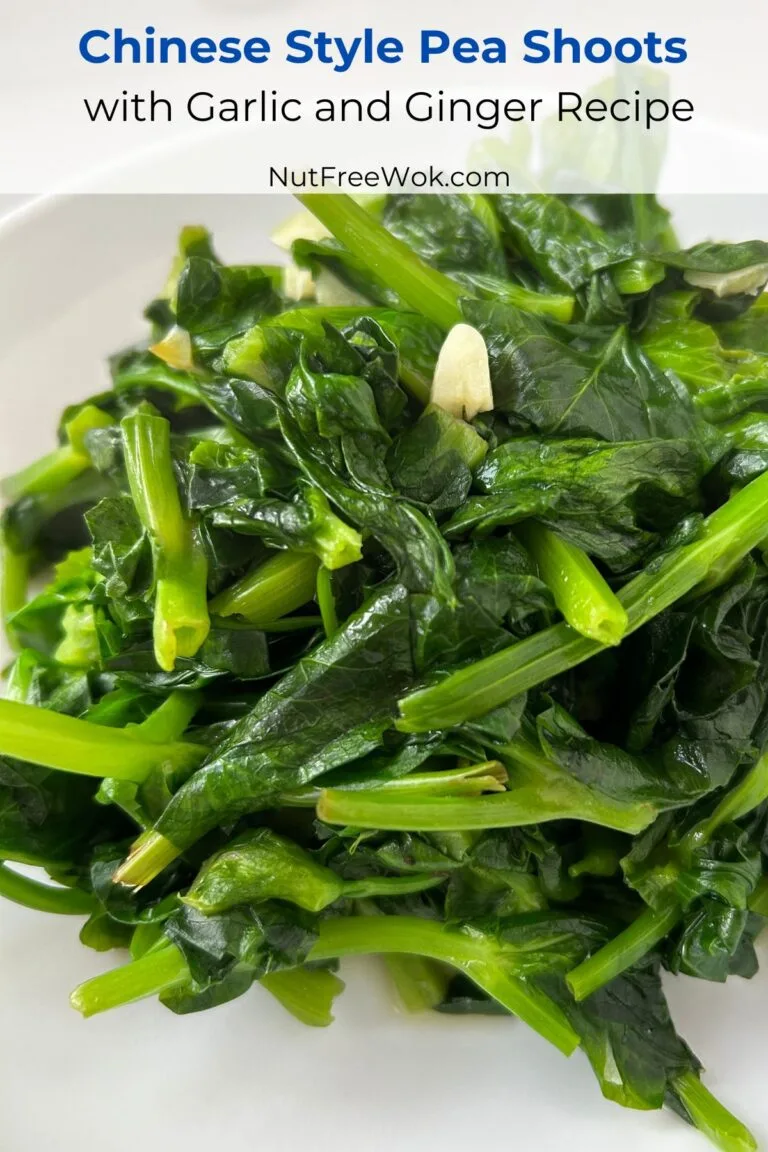 close up of pea shoots stir fried with garlic and ginger