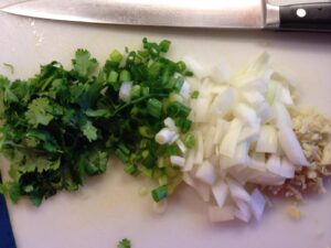 Cilantro, onions, and ginger for an aromatic ginger fried rice