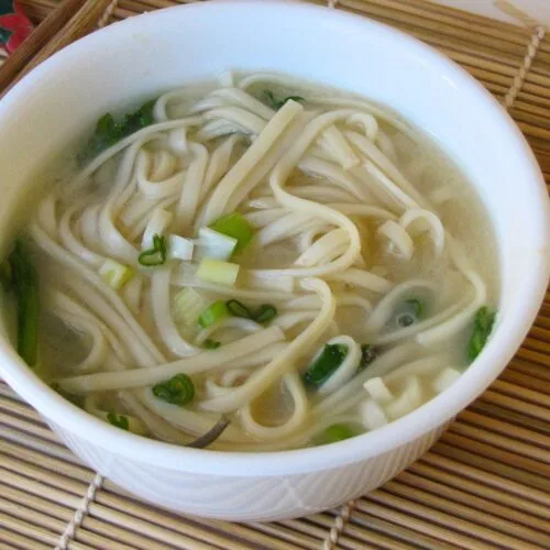 miso noodle soup in a white bowl