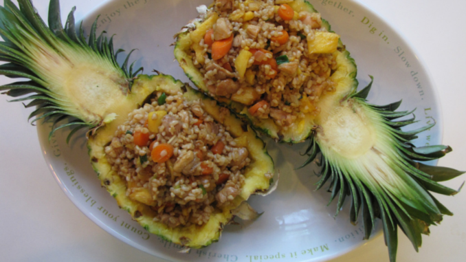 Chicken Pineapple Fried Rice served in carved out pineapple bowls make an impression. #nutfree #friedrice