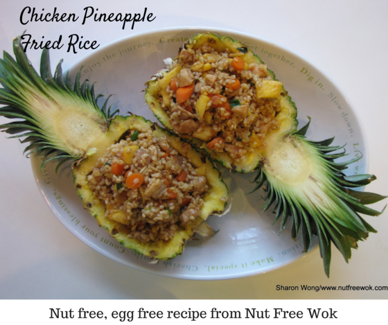 Chicken Pineapple Fried Rice served in carved out pineapple bowls make an impression. #nutfree #friedrice