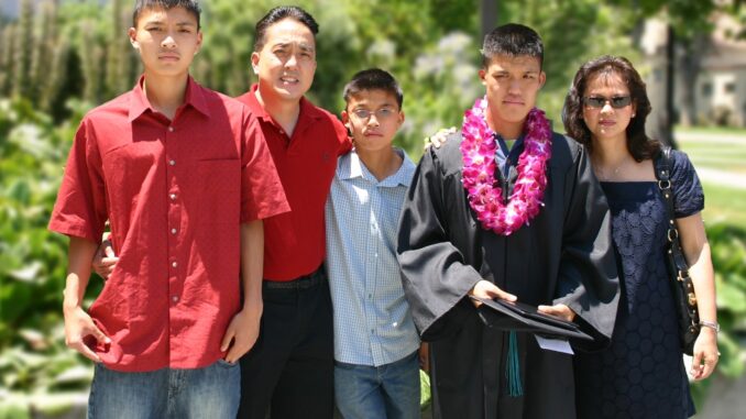 BJ Hom and his family at his graduation