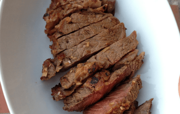 Lemongrass Rib Eye Steak in a white oval bowlNut Free Wok