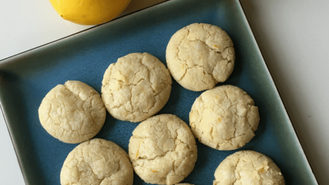 cookies on a blue square plate with two lemonsLemon Vanilla Crinkle Cookies Nut Free Wok