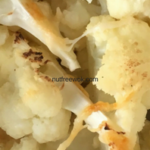 close up of cheesy roasted cauliflower