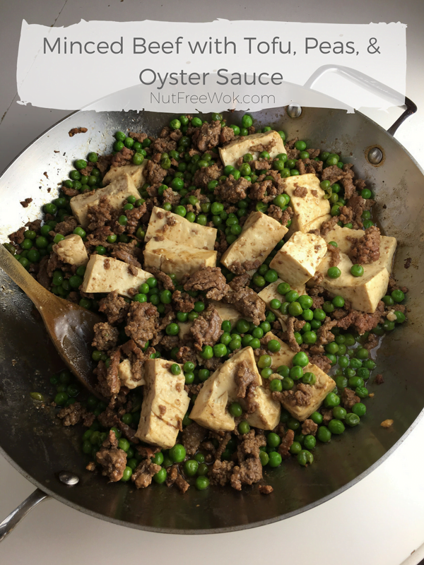 Minced beef with tofu, peas, oyster sauce in a pan