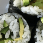 close up of cucumber and avocado sushi