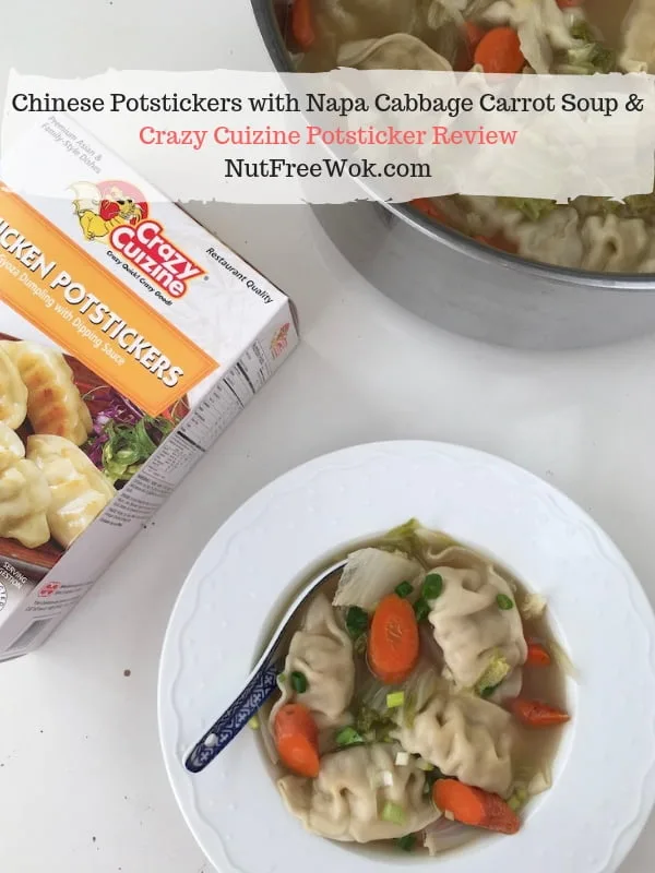 A bowl of napa cabbage carrot potsticker soup is on the table with a pot of soup and a box of Crazy Cuisine potstickers.