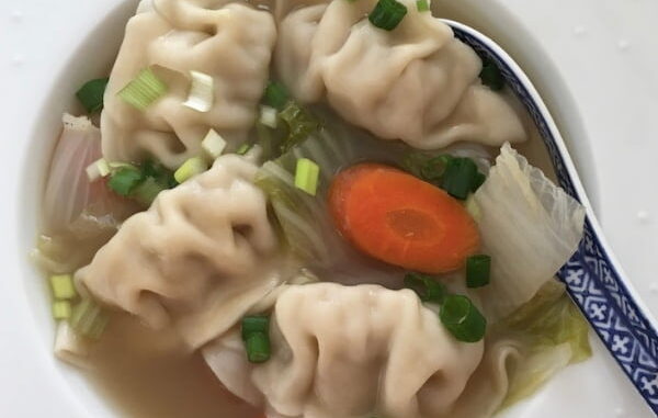 A bowl of napa cabbage, napa cabbage, and carrots in broth is a delicious nut-free hearty soup