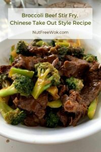 Broccoli Beef is ready to eat, photographed in a white serving bowl.