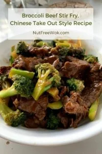 Broccoli Beef is ready to eat, photographed in a white serving bowl.