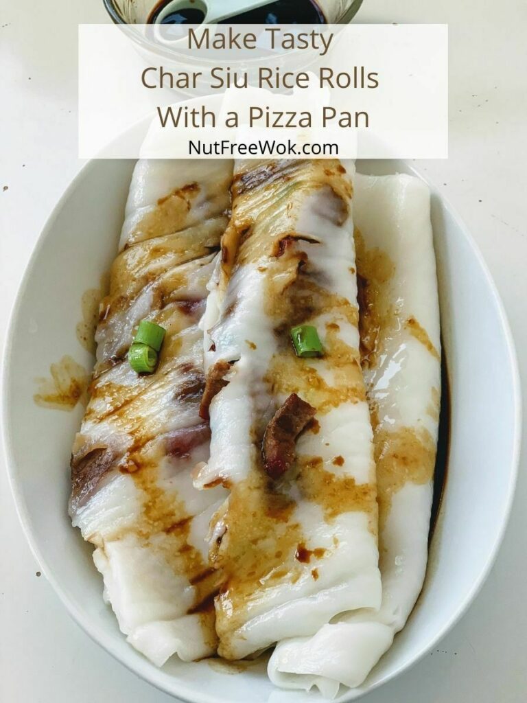 Char siu rice rolls plated in a white oval dish and drizzled with a sweet soy sauce