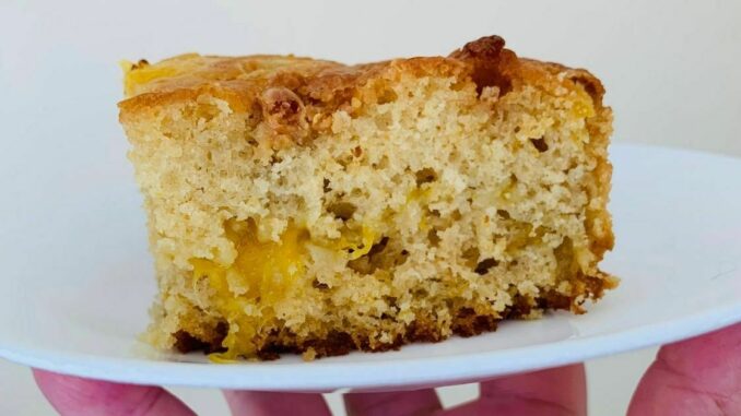 a piece of mango bread on a plate