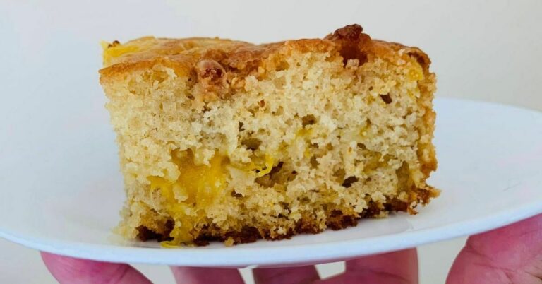 a piece of mango bread on a plate