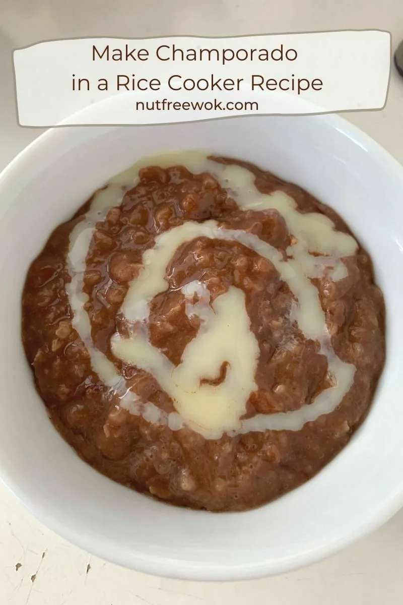 bowl of champorado, chocolate rice porridge, in a bowl with a swirl of sweetened condensed milk