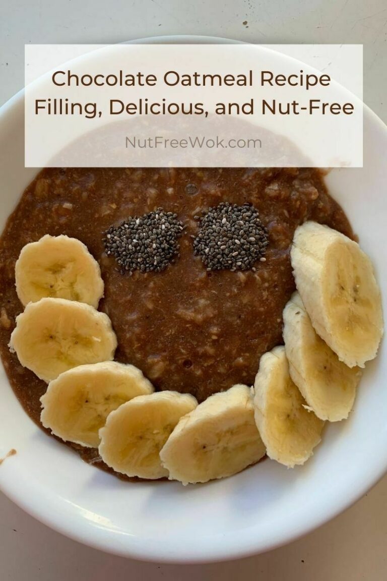 chocolate oatmeal topped with sliced bananas and chia seeds arranged in a smile