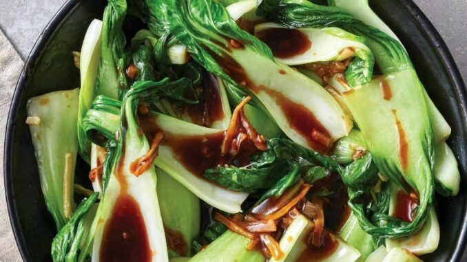 cooked baby bok choy in a serving bowl