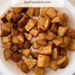 potato home fries on a white serving plate