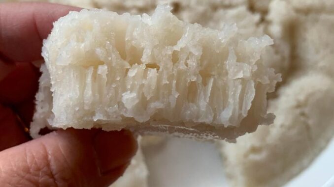 close up of baak tong gou (white sugar cake) to show the honeycomb interior