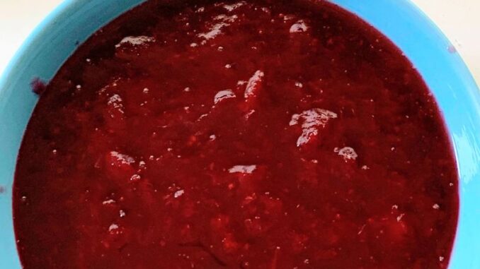 Instant Pot Cranberry Sauce in a blue bowl