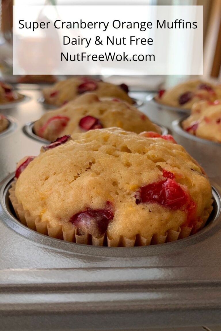 close up of cranberry orange muffin in a muffin tin