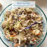 Beef fried rice in a glass pyrex bowl