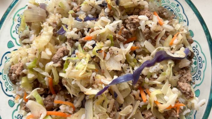 Beef fried rice in a glass pyrex bowl