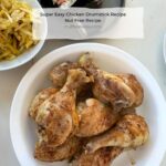 plate of chicken drumsticks, baked and ready to eat