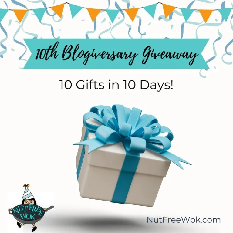 10th blogiversary, 10 gifts in 10 days, image of a gift with a blue bow dropping