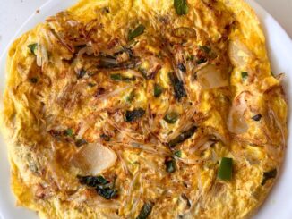 herb frittata on a white plate