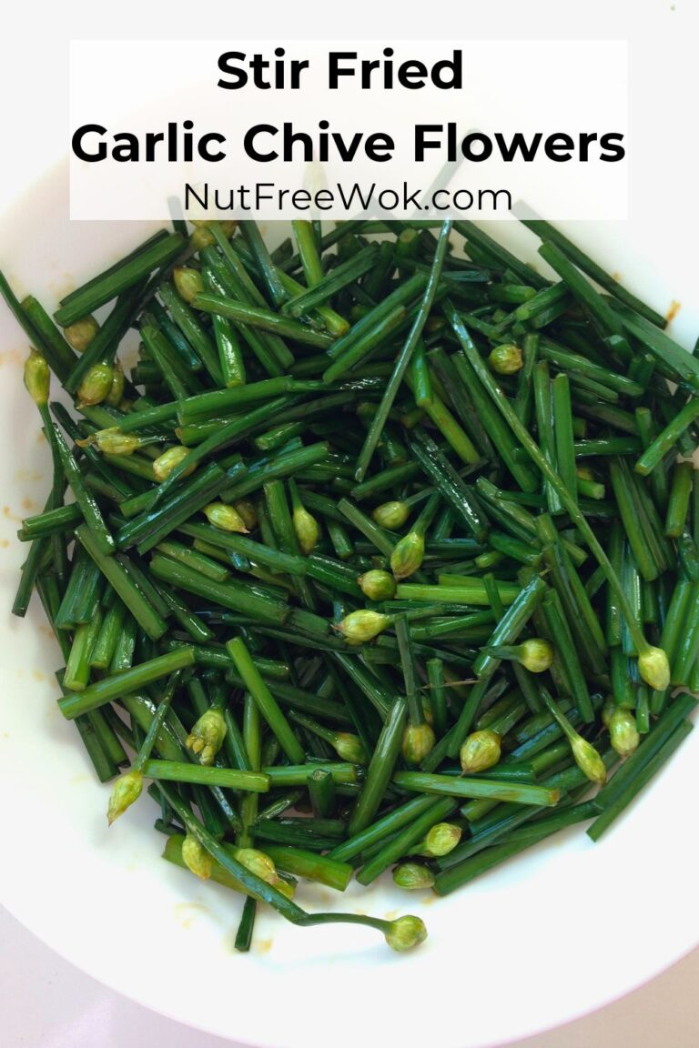 stir fried garlic chives in a white plate