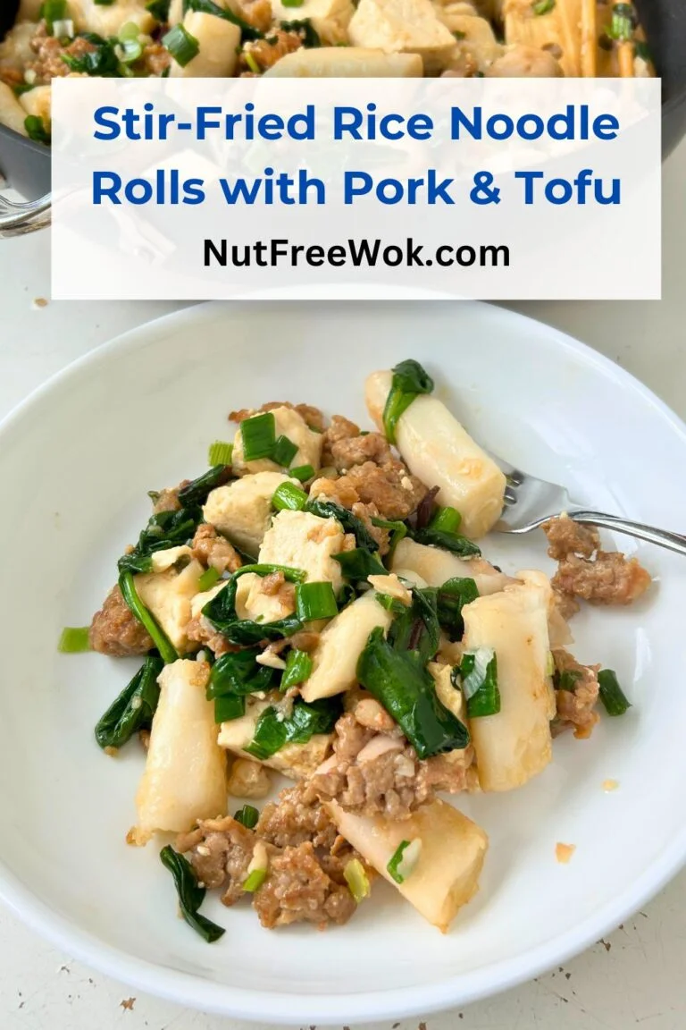 Stir-Fried Rice Noodle Rolls with Pork & Tofu, served in a white bowl