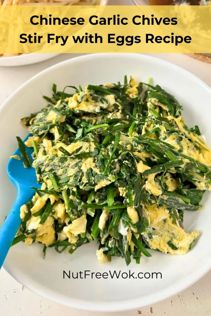 stir fried garlic chives with eggs served in a white bowl