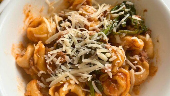 Easy Instant Pot Tortellini with Meat Sauce served in a white bowl