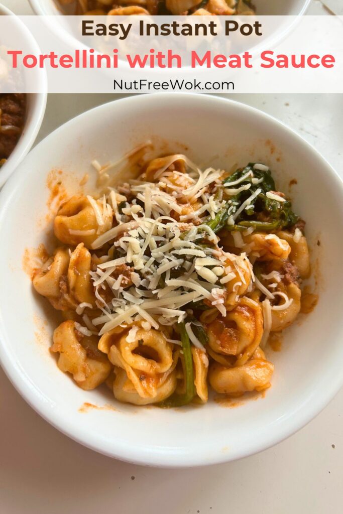 Easy Instant Pot Tortellini with Meat Sauce served in a white bowl