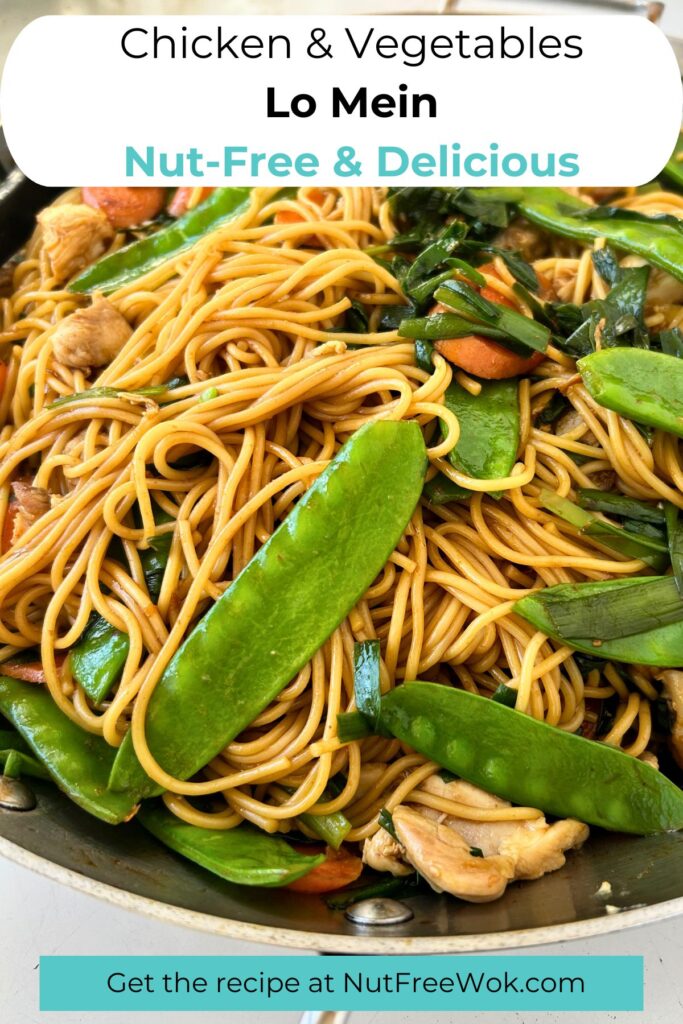 cooked lo mein in a large frying pan