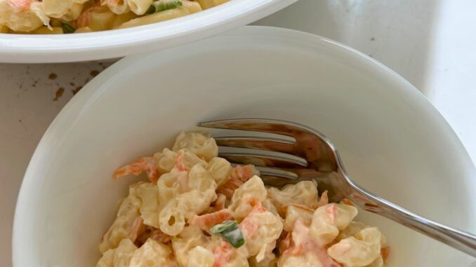 close up of Hawaiian macaroni salad served in a white bowl