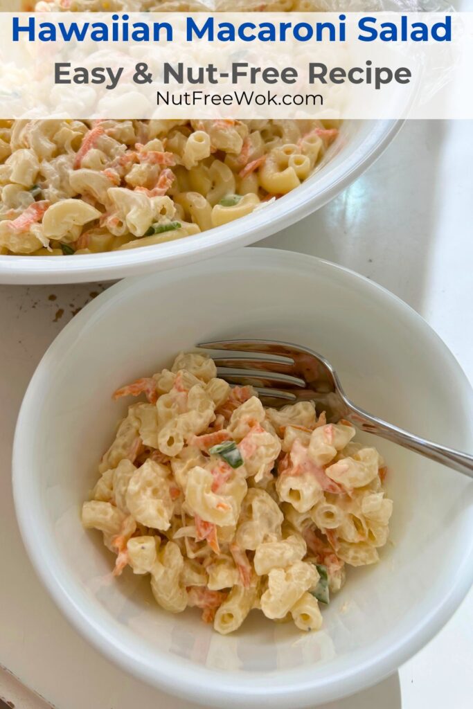 close up image of Hawaiian macaroni salad served in a white bowl with a fork