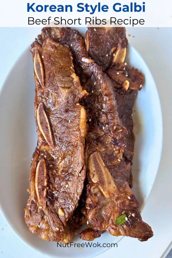 cooked beef short ribs served in a white oval serving dish