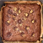 overhead perspective of baked brownies in a square baking pan