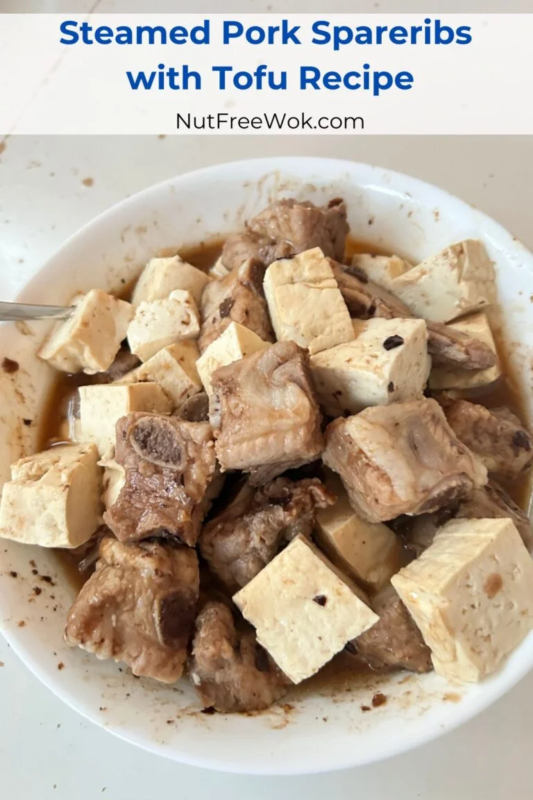 steamed spareribs with tofu in a white serving bowl