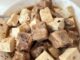 steamed spareribs with tofu in a white serving bowl