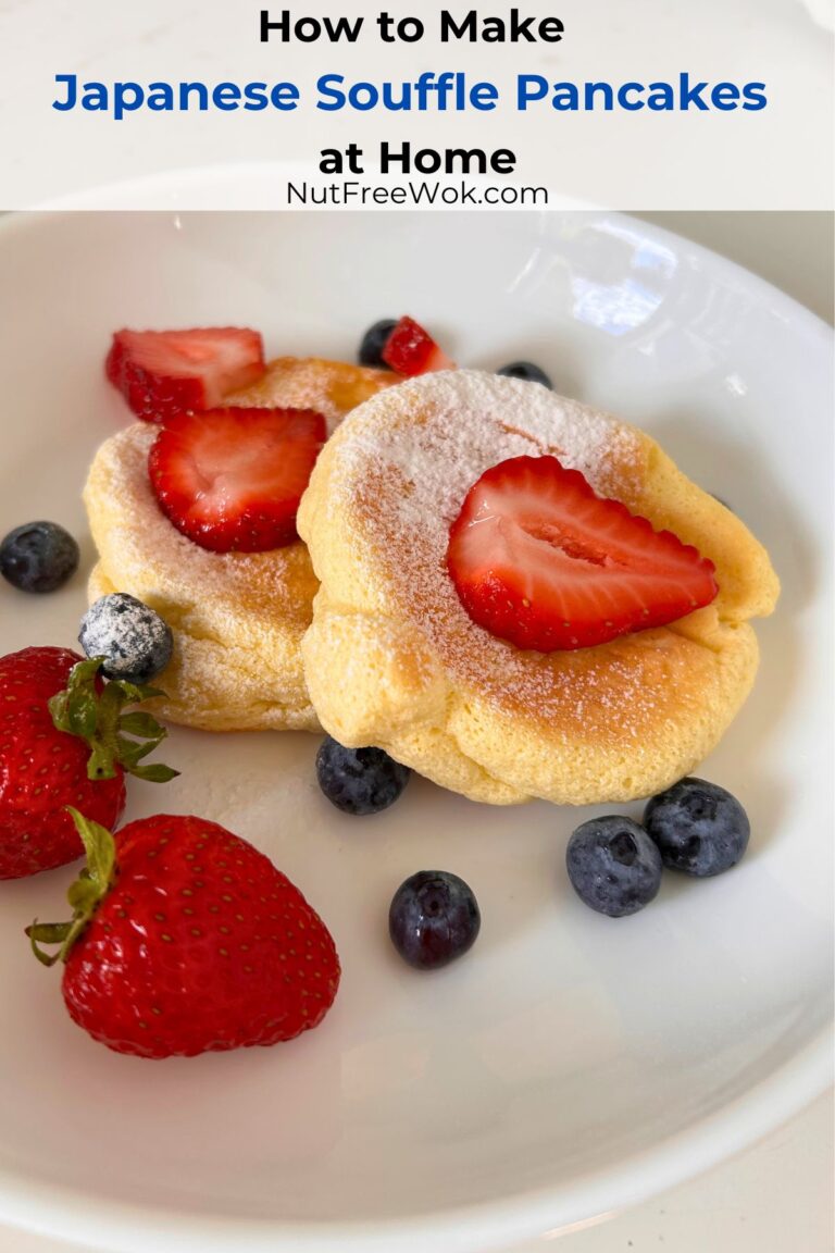 Japanese souffle pancakes served with strawberries and blueberries