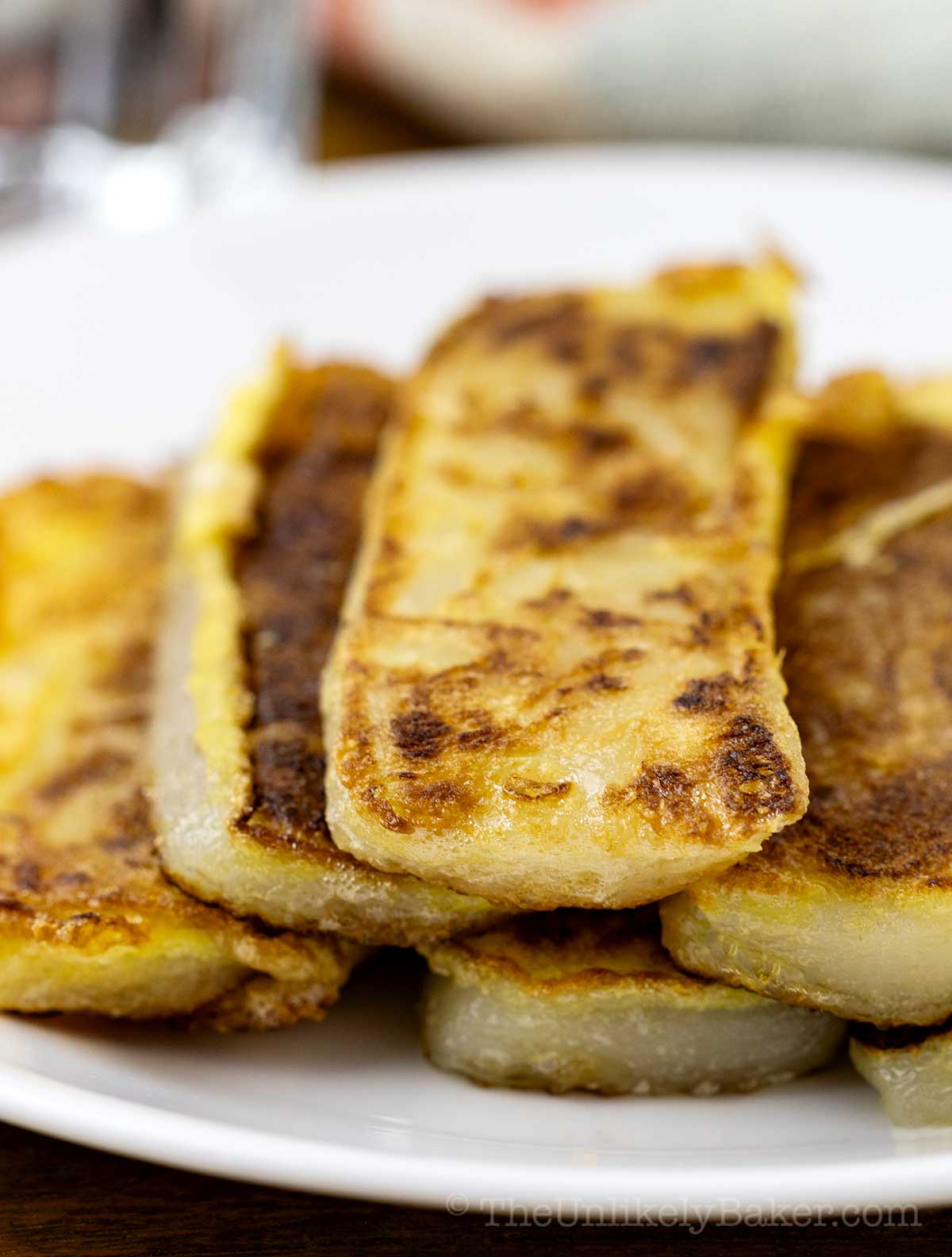 pieces of tikoy stacked on a plate