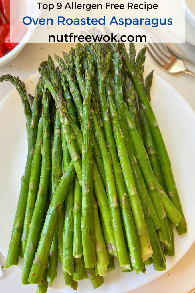 oven roasted asparagus on a white plate