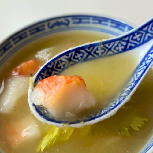 blue and white soup spoon with some Miso celery soup