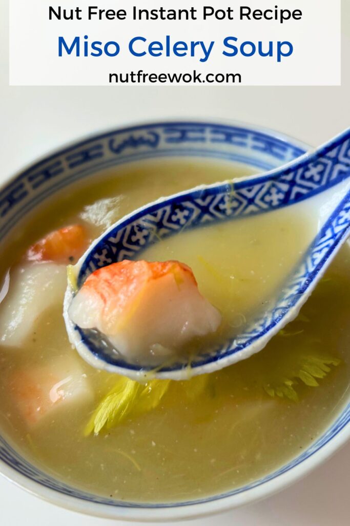 a blue and white soup spoon with some miso celery soup